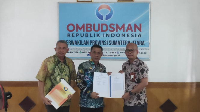 Ombudsman Sumut menyerahkan LAHP penerapan parkir berlangganan.