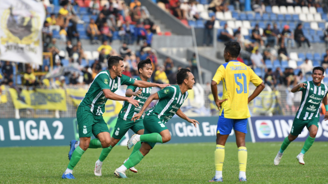 Selebrasi pemain PSMS Medan, Rahmat Hidayat usai mencetak gol.