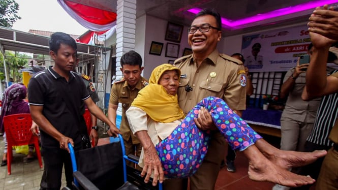 Kadinkes Kabupaten Deliserdang, Asri Ludin Tambunan.