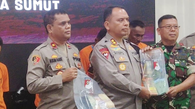 Kapolres Sergai AKBP. Jhon Herry Rakuta Sitepu, saat memberikan keterangan pers pengungkapan kasus judi.