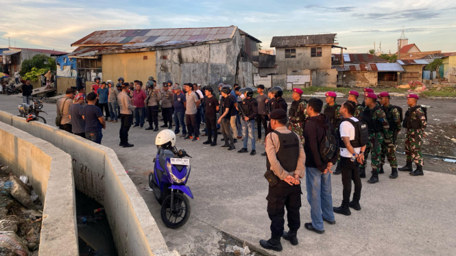 TNI/Polri apel saat melakukan pengamanan di lokasi tawuran di Belawan.