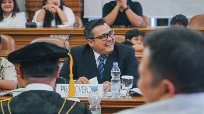 Topan Ginting usai jalani sidang terbuka promosi Doktor.