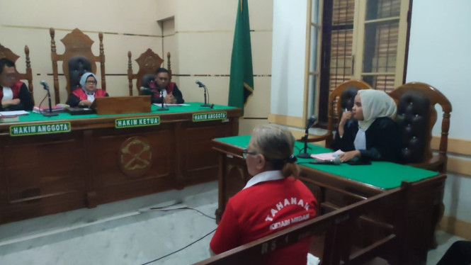 Tiromsi Sitanggang, terdakwa bunuh suami.