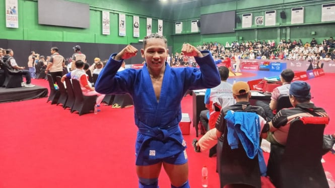 Atlet Sambo Sumut, Andri Irwansyah Silaen raih emas di PON Bela Diri 2025.