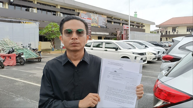 Samuel Marpaung, kuasa hukum Pdt Asaf Marpung di Polrestabes Medan.