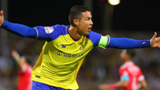 Selebrasi Cristiano Ronaldo usai mencetak gol. Selebrasi Cristiano Ronaldo usai mencetak gol.