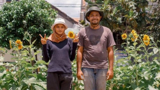 Vania dan Galih inisiator seni tani. Vania dan Galih inisiator seni tani.