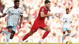 Dominik Szoboszlai saat tampil dengan seragam Liverpool. Dominik Szoboszlai saat tampil dengan seragam Liverpool.