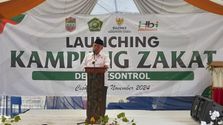 Sambutan Ketua Baznas Ciamis, H. Lili Miftah. Sambutan Ketua Baznas Ciamis, H. Lili Miftah.