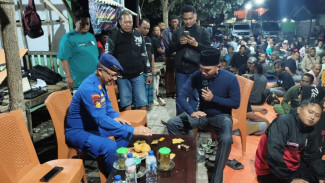Jaga Kamtibmas, Satpolairud Situbondo Gelar Lomba Domino untuk Nelayan