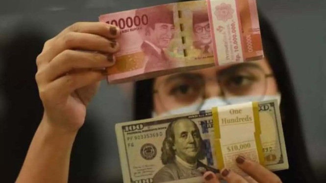 Ilustrasi uang Rp.100 ribu rupiah.