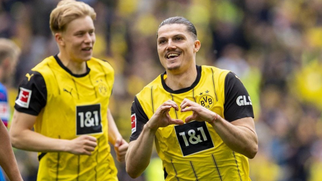 Borussia Dortmund gaet tiket Liga Champions