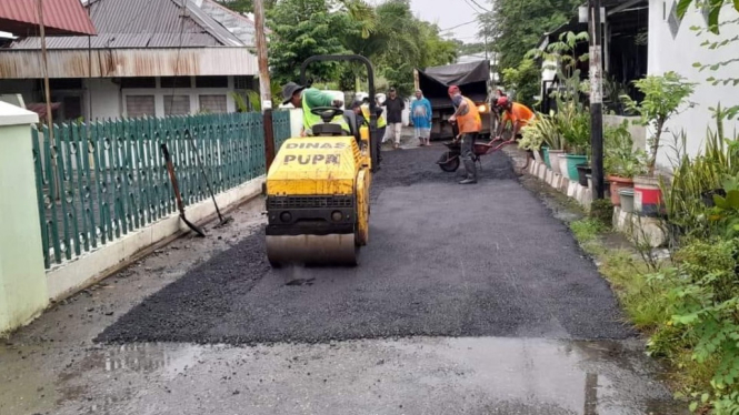 Proses perbaikan jalan