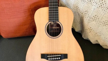 Gitar Akustik (foto ilustrasi).