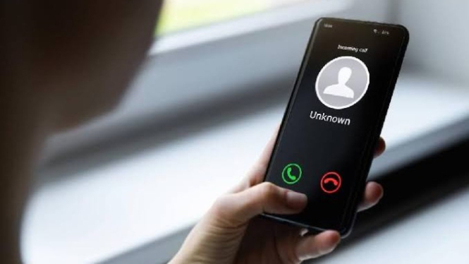 Ilustrasi Panggilan WhatsApp dari Nomor tak Dikenal