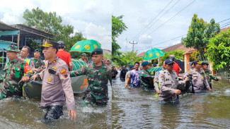 Viral Polisi dan TNI Makamkan Jenasah Tembus Banjir Besar di Trimulyo Semarang