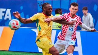 Kroasia dan Ghana Lolos