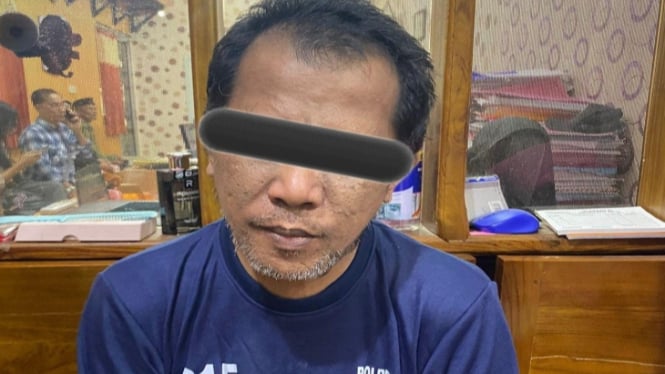 Pelaku penggantian foto film dewasa.