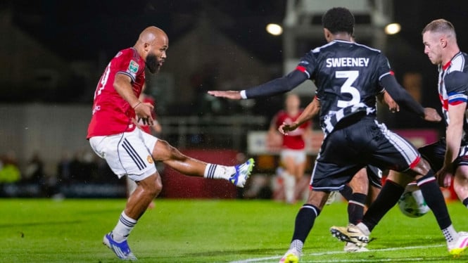 Laga Grimsby Town vs  Manchester United.