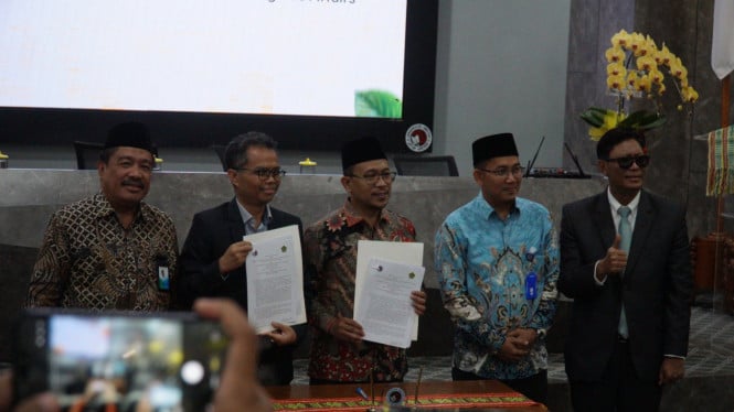 Penandatangan Implementation Agreement PKUB Kemenag RI dan CSR-CMR