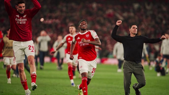 Arsenal merayakan lolos ke babak final Liga Champions.