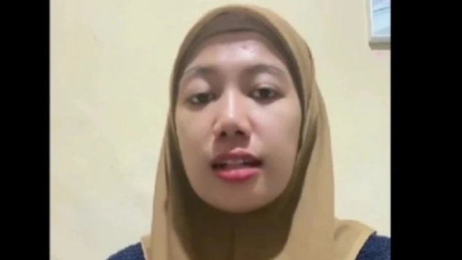 Potret tangkapan layar video  May Rahmawati