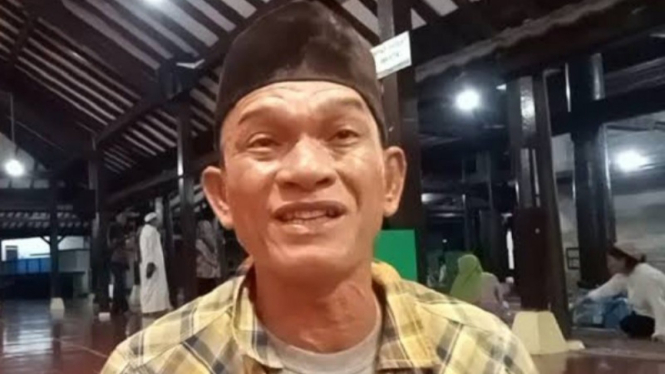 Potret almarhum Abi Budi