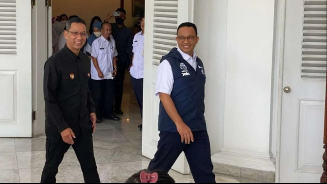 Potret Heru Budi dan Anies Baswedan