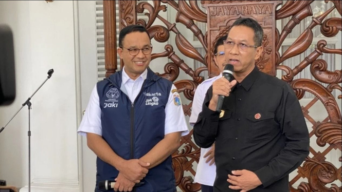 potret Anies Baswedan dan Heru Budi