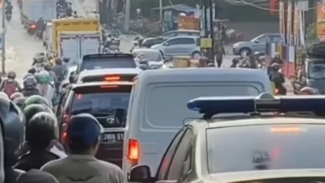 Ilustrasi macet di Jalan Raya Sawangan Depok