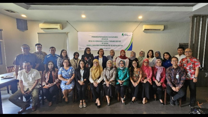 Potret foto bersama BPJS Ketenagakerjaan Depok