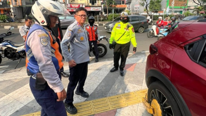 Potret aksi penertiban Parkir sembarangan di Jalan Margonda