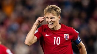 Duel Eks Real Madrid! Odegaard Siap Rusak Misi Vinicius di Fase Gugur 16 Besar