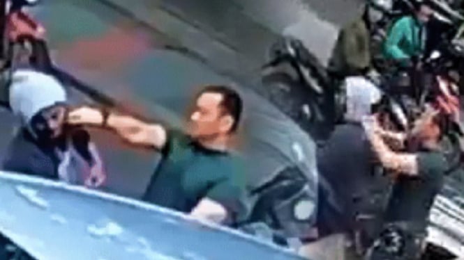 Tangkapan Layar Video Viral Jukir Dianiaya