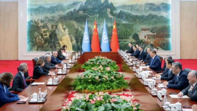 Xi Jinping saat bertemu dengan Sekretaris Jenderal PBB