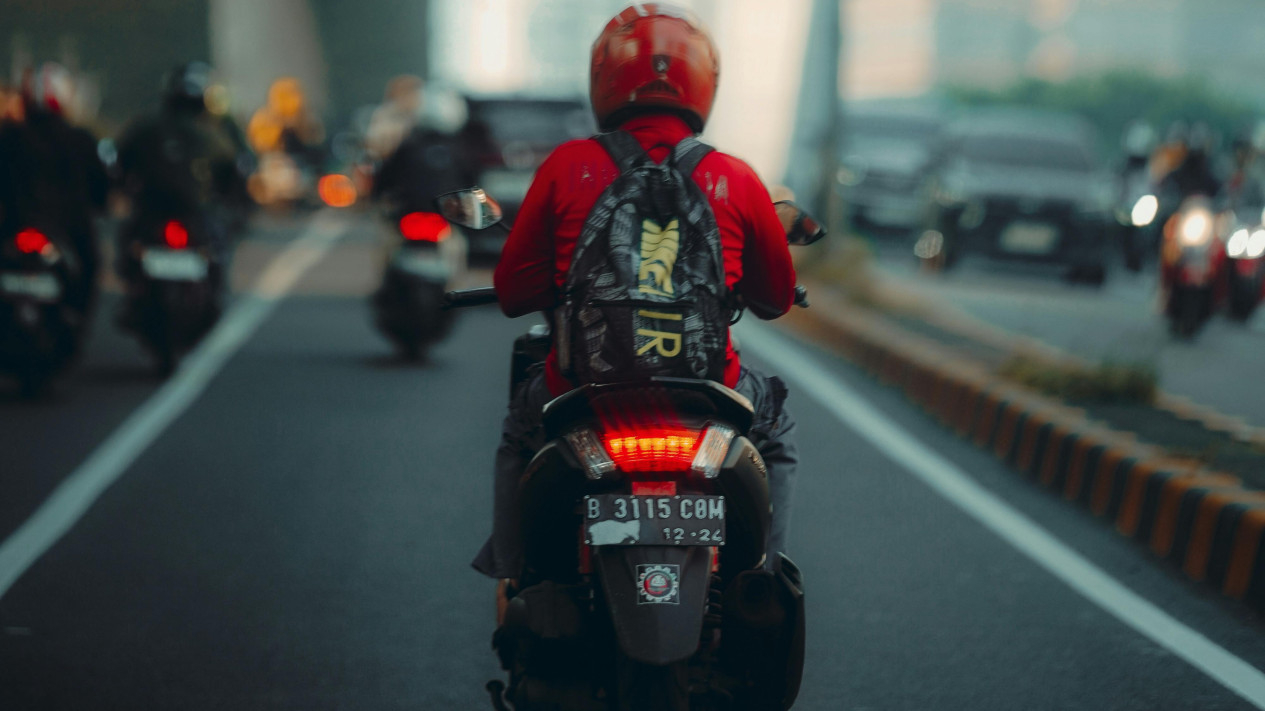 He Drives Motorcycle