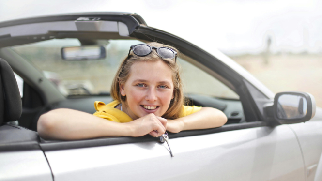 Girl drives car