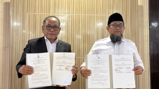 Jalin Kerjasama Optimalkan Peran Perpustakaan: Dispusarsip dan Disdik Sulawesi Selatan Tandatangani Perjanjian
