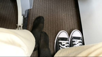 Mengapa Menjaga Kaki Tetap Bersepatu adalah Kunci Kenyamanan selama Penerbangan Anda