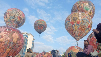 Ribuan Warga Nikmati Festival Balon Udara UMP di Banyumas, Jawa Tengah, 31 Balon Mengudara