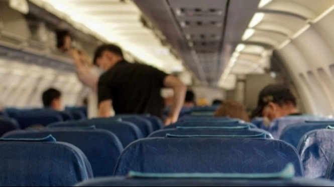 Ilustrasi penumpang di kabin pesawat