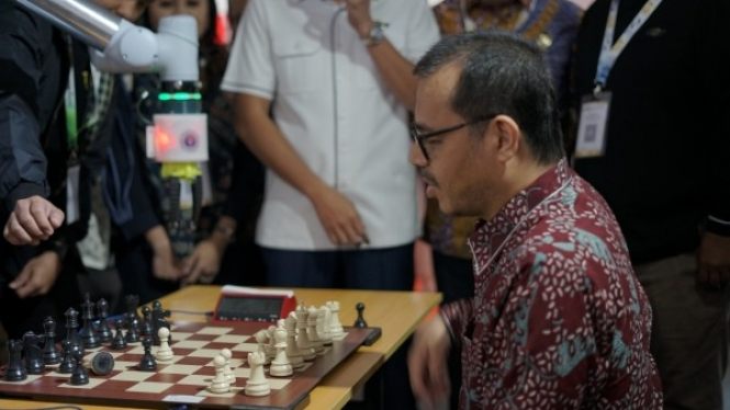 Wamenkoimfo Bermain Catur Vs AI di Ajang IIXS 2024