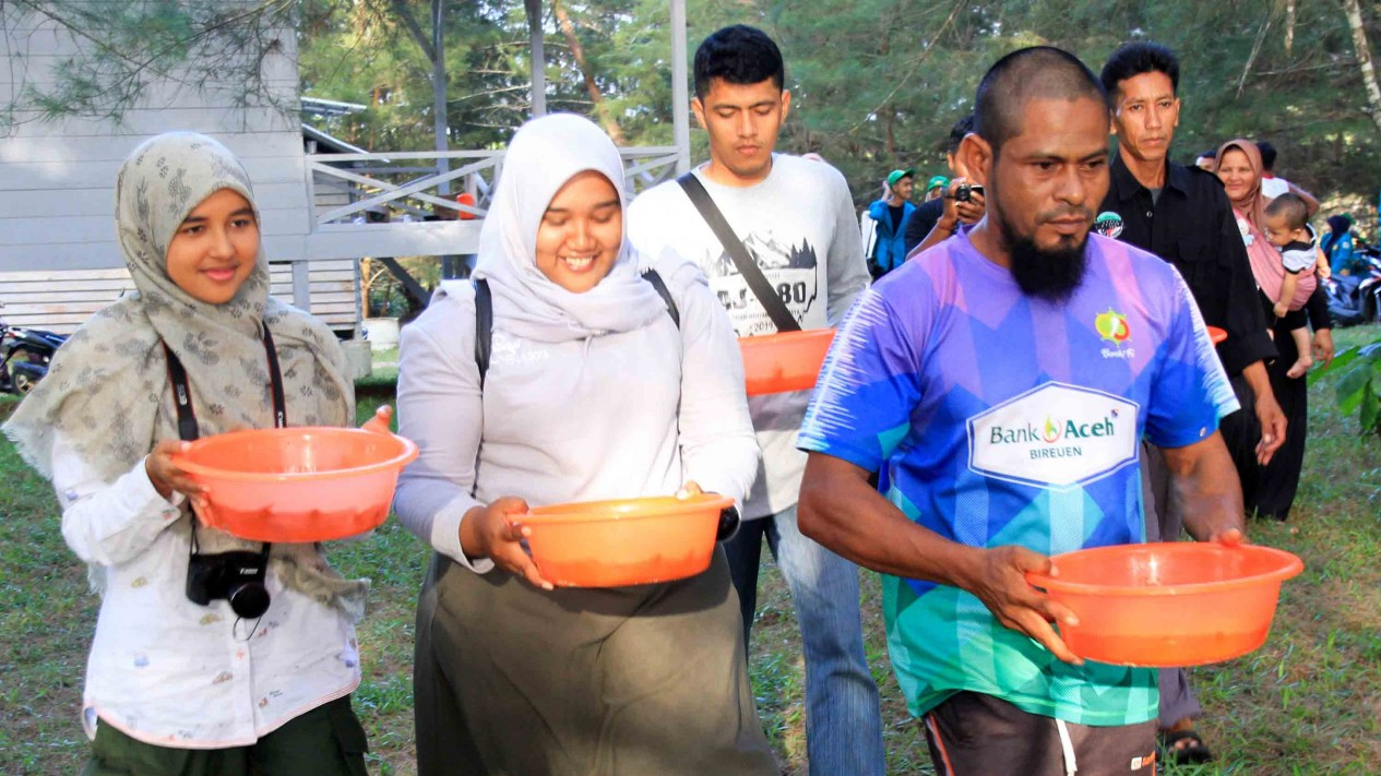 Proses Pelepasan Tukik Kembali ke Habitatnya