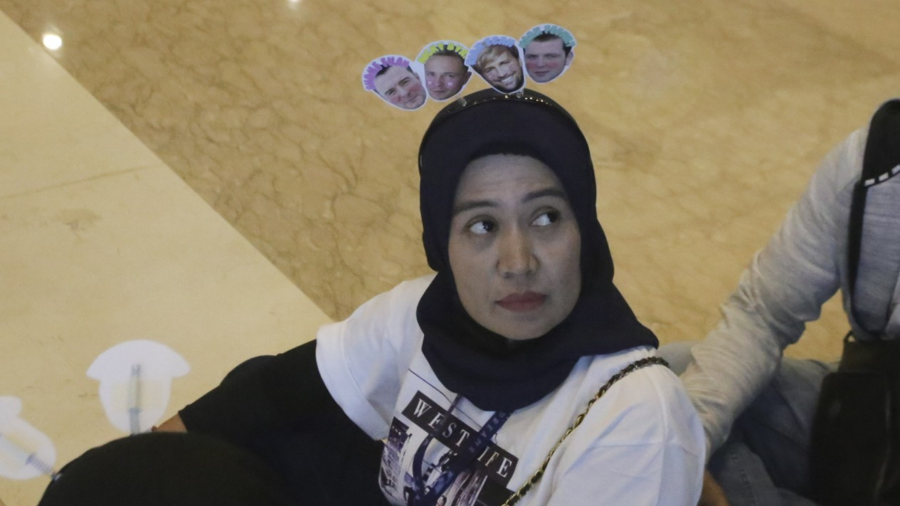 Antusias Penggemar Antri Konser Westlife