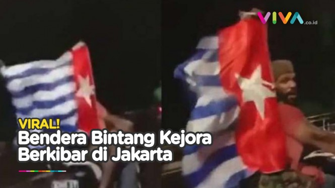 Pria Papua Ngebut Sambil Kibarkan Bendera Bintang Kejora
