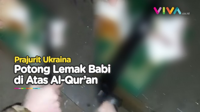 BIADAB! Prajurit Ukraina Potong Lemak Babi di Atas Al-quran