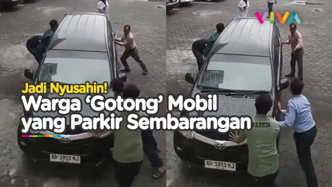 Belasan Orang 'Gotong' Mobil yang Parkir Liar+Rem Tangan