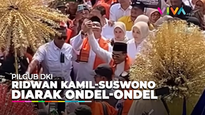 Ribuan Orang Sambut Ridwan Kamil-Suswono Diarak Ondel-ondel