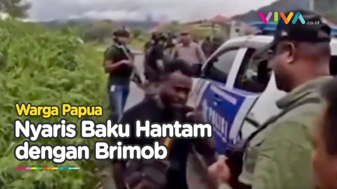 VIRAL! Warga Papua Hadang Brimob Tidak Boleh Lewat