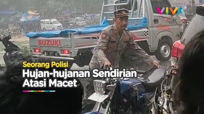 Citra Buruk Luntur! Polisi Basah Kuyup Sendirian Atasi Macet